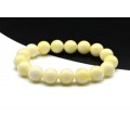 Браслет из янтаря искусственного шарик 12мм цвет молочный, 17см