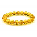 Браслет из янтаря шарик 10мм лимонный (иск.)