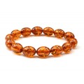 Браслет из янтаря овал 10*14мм коньячный (иск.)