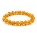 Браслет из янтаря шарик 10мм медовый (иск.)