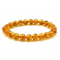 Браслет из янтаря шарик 8мм цвет медовый. (иск.) Браслет из янтаря шарик 8мм цвет медовый. (иск.)