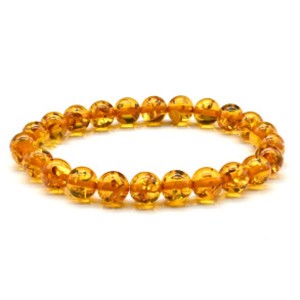 Браслет из янтаря шарик 8мм цвет медовый. (иск.)