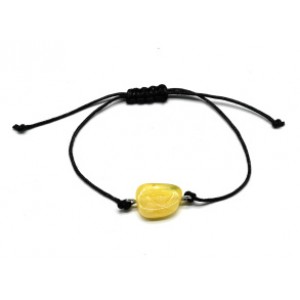 Браслет с Руной Вуньо из янтаря 10*17мм на шнурке цвет лимонный