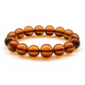 Браслет из янтаря шарик 12мм коньячный (иск.)