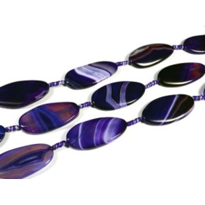 Бусины из агата тонированного т.овал 25*50мм цв.фиолетовый витой, 42см, 7 бусин
