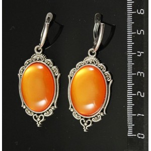 Серьги пластик оранжевый (эффект опала), овал 25х18мм, оправа "медальон", швензы посеребрение