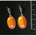 Серьги пластик оранжевый (эффект опала), простой овал 25х18мм, швензы посеребрение