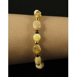 Браслет опал желтый (овалы) и гематит (шарик золотистый и черный хамелеон)