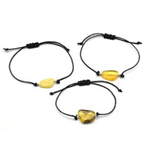 Руна Альгиз браслет с янтарем 10*17мм на шнурке цвет медово-молочный Руна Альгиз браслет с янтарем 10*17мм на шнурке цвет медово-молочный