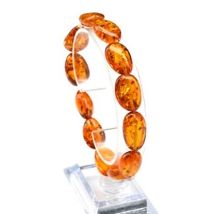 Браслет из янтаря галтовка цвет коньячный 12*18мм, 18см (иск.) Браслет из янтаря галтовка цвет коньячный 12*18мм, 18см (иск.)