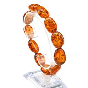 Браслет из янтаря галтовка 15*22мм цвет коньячный, (иск.)