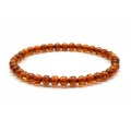 Браслет из янтаря шарик 5мм коньячный, 17см (иск.) Браслет из янтаря шарик 5мм коньячный, 17см (иск.)