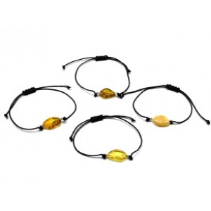 Руна Лагуз на браслете с янтарем 10*17мм на шнурке цвет медово-молочный Руна Лагуз на браслете с янтарем 10*17мм на шнурке цвет медово-молочный