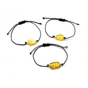 Руна Соулу на браслете с янтарем 10*17мм на шнурке цвет медово-молочный Руна Соулу на браслете с янтарем 10*17мм на шнурке цвет медово-молочный