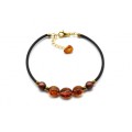 Браслет на руку с янтарем на каучуковой струне галтовка 8*8мм цвет коньячный, 16см.