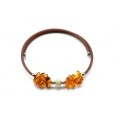 Браслет на каучуковой струне с янтарем галтовка цвет коньячный, 17см.