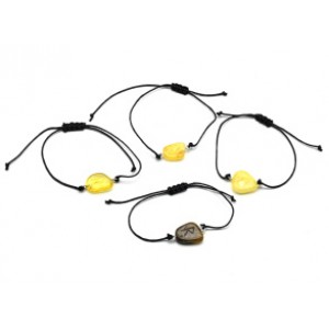 Браслет с Руной Райдо из янтаря 10*17мм на шнурке цвет медово-молочный