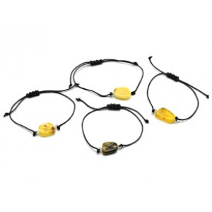 Браслет с Руной Гебо из янтаря 10*17мм на шнурке цвет медово-молочный