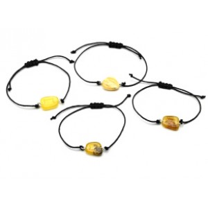 Браслет с Руной Перт из янтаря 10*17мм на шнурке цвет медово-молочный