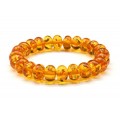 Браслет из янтаря рондель 11*7мм цвет медовый, 15см (иск.)