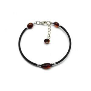 Молодежный браслет с янтарем на каучуке овал 7*10мм цвет коньячный, 16см.