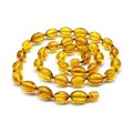 Бусы из янтаря рис 9*13мм цвет медовый, 49см (иск.)