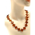 Бусы янтарные ромб 20-22мм коньячный, 55см (иск.)