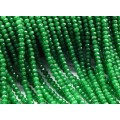 Бусины из кварца тонированного рондель гр.4*3мм, цвет ярко-зеленый, 35см, 115 бусин Бусины из кварца тонированного рондель гр.4*3мм, цвет ярко-зеленый, 35см, 115 бусин