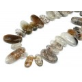 Бусины из кварца рутилового овалы 15-45мм, 39см, 28 бусин