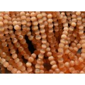 Бусины из кошачьего глаза (синт.) (улексит) шарик гр.6мм цвет персиковый, 40см, 70 бусин (иск.)