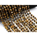 Бусины из тигрового глаза овал витой 7*8мм, 39см, 37 бусин