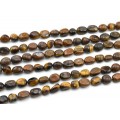 Бусины из тигрового глаза галтовка 10*15мм, 40см, 27 бусин