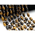 Бусины из тигрового глаза рис 8*13мм, 39см, 23 бусины