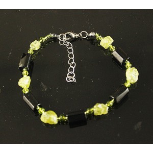 Браслет из гематита (цилиндры) и хризолита необработанного, с хрусталем, на застежке