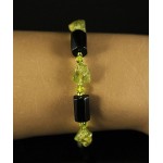 Браслет из гематита (цилиндры) и хризолита необработанного, с хрусталем, на застежке