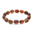 Браслет из янтаря овал 10*14мм цвет коньячный, 17см