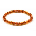 Браслет из янтаря шарик 6мм цвет коньячный, 17см (иск.) Браслет из янтаря шарик 6мм цвет коньячный, 17см (иск.)
