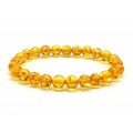 Браслет из янтаря шарик 8мм цвет лимонный, 17см (иск.) Браслет из янтаря шарик 8мм цвет лимонный, 17см (иск.)