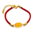 Красная нить на запястье с янтарной вставкой овал 10*17мм цвет медовый, 18см (иск.)