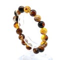Браслет с шариками из янтаря 12мм цвет шоколадно-лимонный, 17см (иск.)
