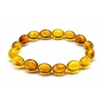 Браслет из янтаря рис 9*13мм цвет медовый, 17см (иск.)