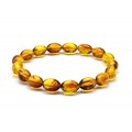 Браслет из янтаря рис 7*11мм цвет медовый, 17см (иск.)