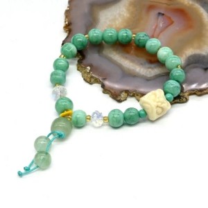 Браслет Голова Льва шарик 8мм цвет мятный, 17см (иск.)