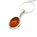 Кулон с янтарём в посеребрении овал 15*20мм цвет коньячный Кулон с янтарём в посеребрении овал 15*20мм цвет коньячный