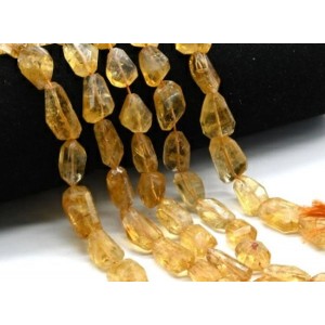 Бусины из цитрина галтовка с гранями 10*15мм, 24см, 16 бусин, 31г Бусины из цитрина галтовка с гранями 10*15мм, 24см, 16 бусин, 31г