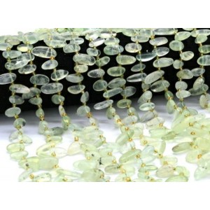 Бусины из пренита галтовка 6*14мм, 38см, 48 бусин Бусины из пренита галтовка 6*14мм, 38см, 48 бусин