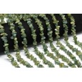 Бусины из пренита (Гроссуляра) с хризоберилом галтовка 8*3мм, 40см, 145 бусин