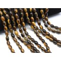 Бусины из тигрового глаза рис 8*12мм, 39см, 33 бусины
