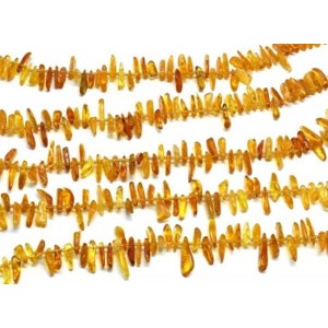 Бусины из янтаря рожки 17*5мм цвет медовый, 38см, 80 бусин