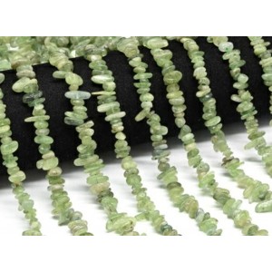 Бусины из кианита зеленого галтовка 7*3мм, 40см, 145 бусин Бусины из кианита зеленого галтовка 7*3мм, 40см, 145 бусин